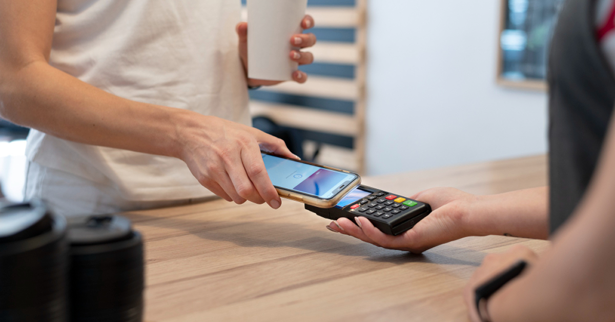 Person paying using a mobile phone